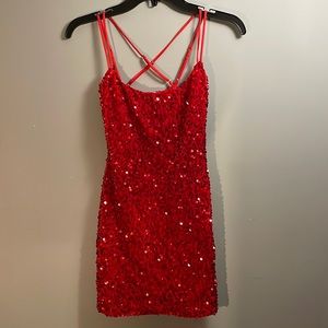Lucy In The Sky Homecoming dress, Size XS. Crisscross back, no zipper. Worn once